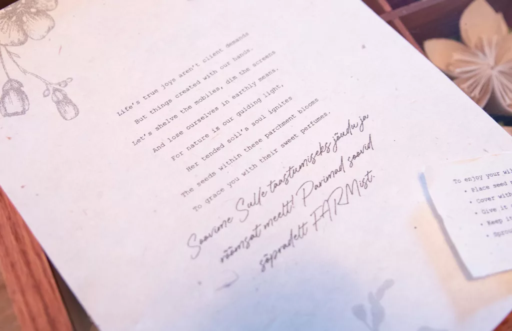 Close up of a letter with poetry written on it.