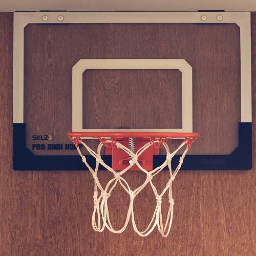 Door mounted basketball hoop.